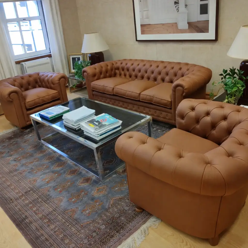 Retapizado de juego de sillones Chesterfield en cuero marrón
