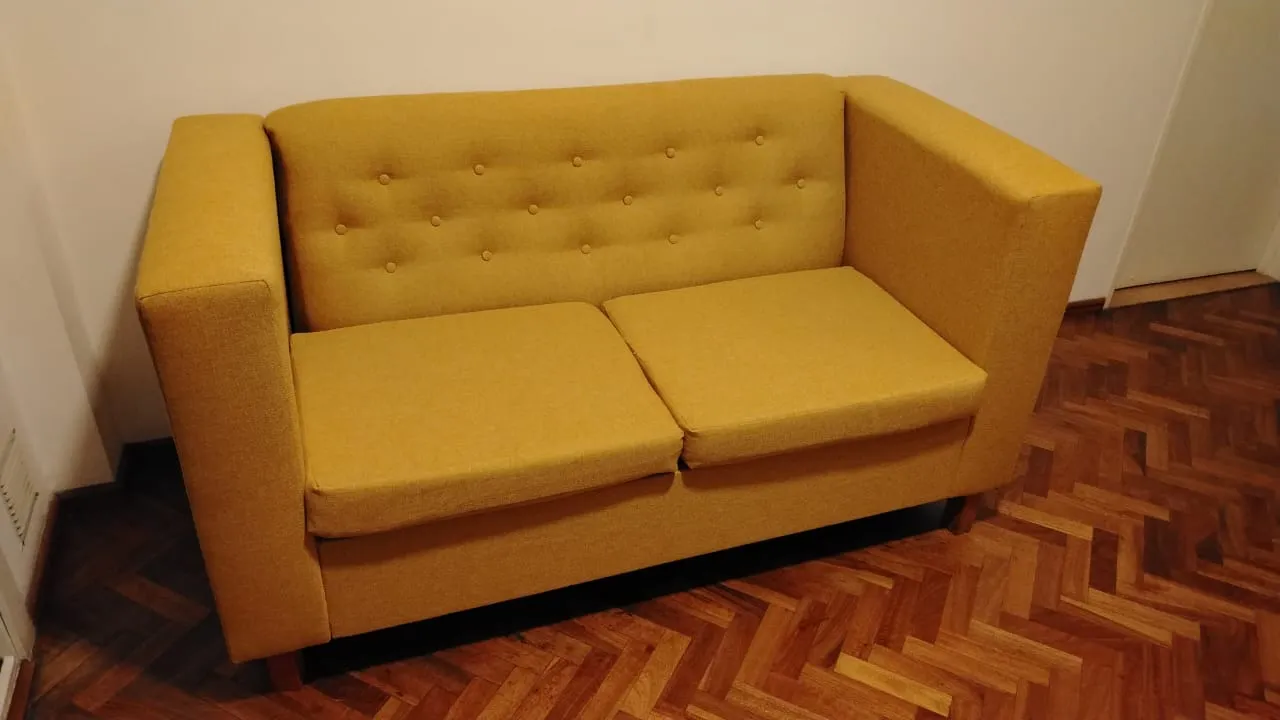 Retapizado de sillón esquinero en tela gris en Rosario